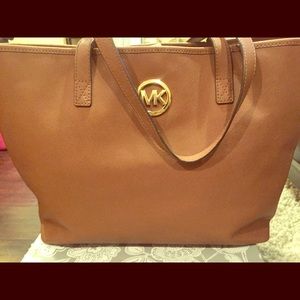 Michael Kors emblem tote.